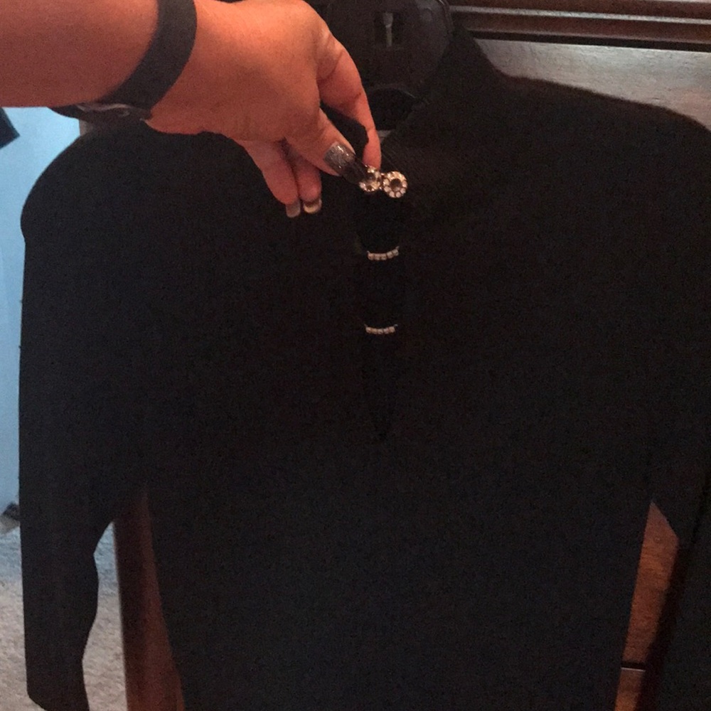 Very pretty and nice material black sweater.
